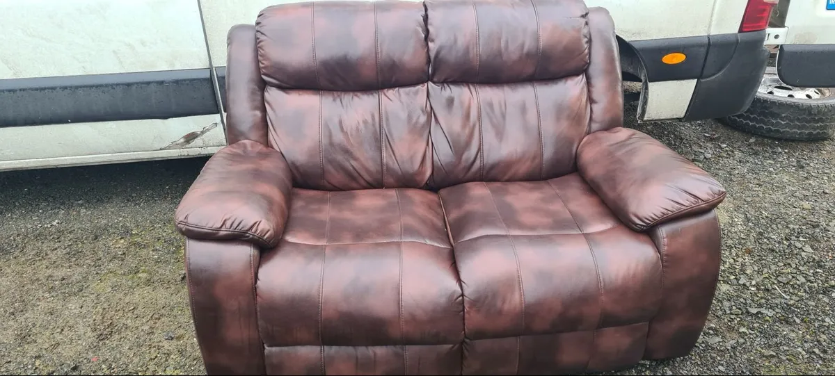 Two seater soft leather space saving couch