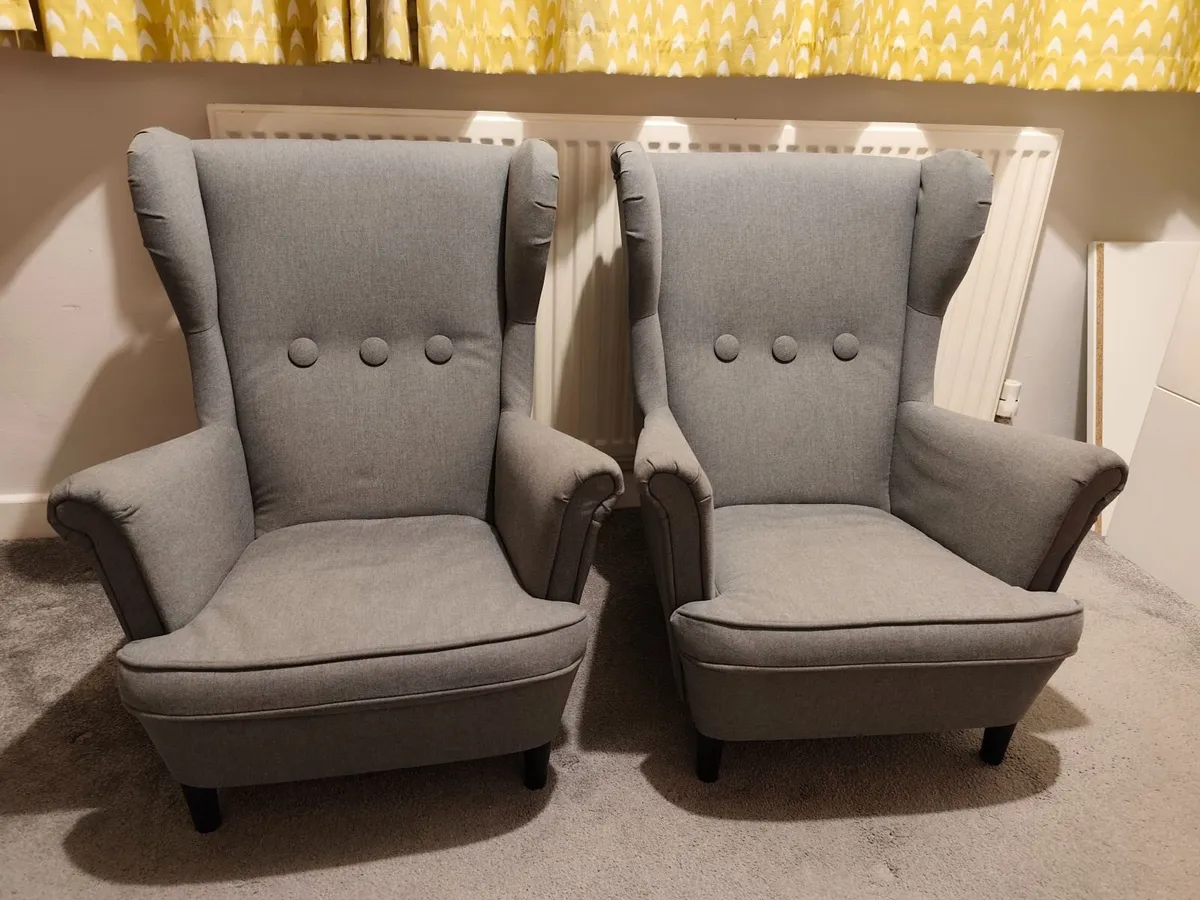 2 grey IKEA Strandmon kids armchairs