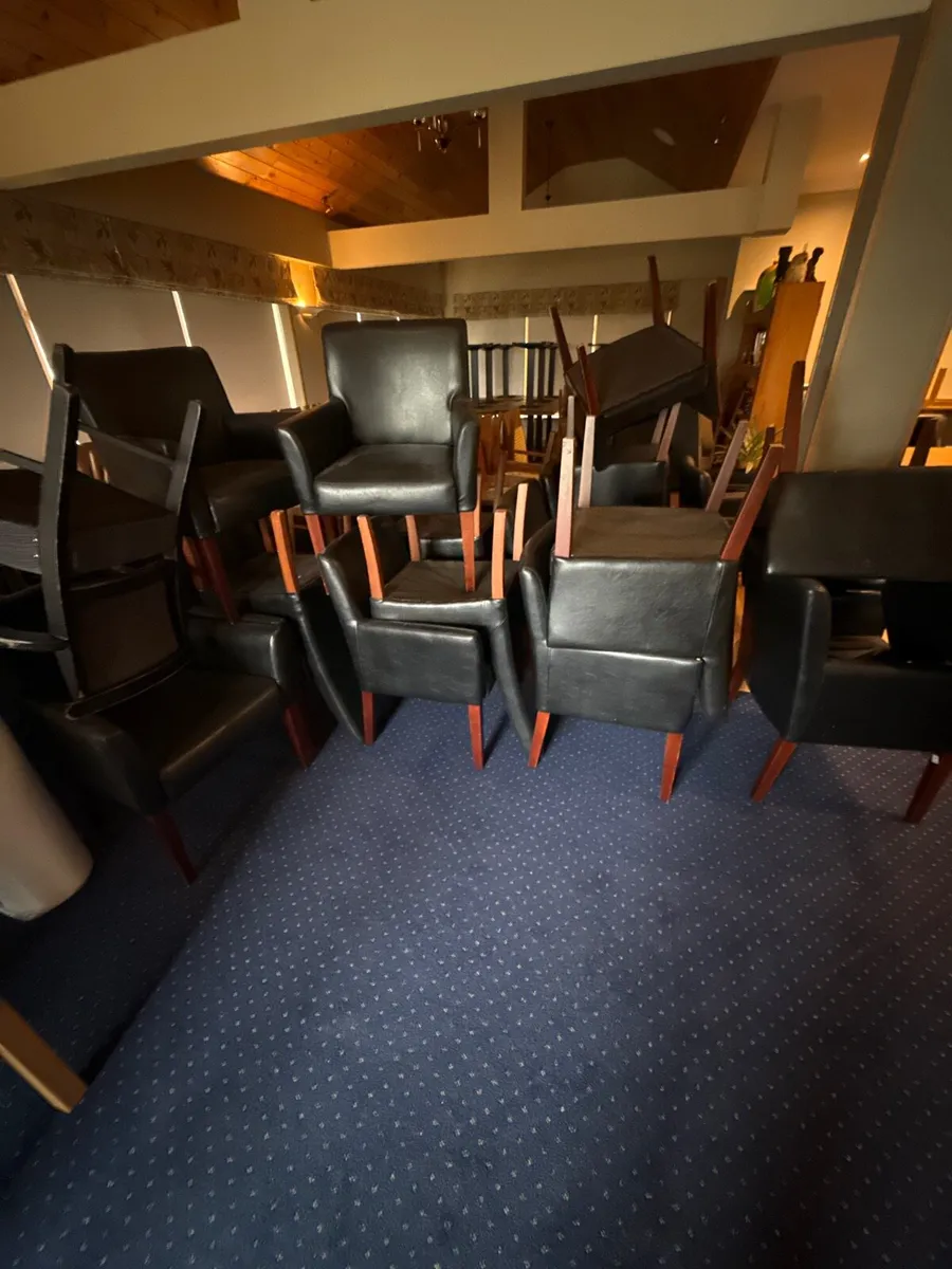 Solid black leather chairs - Image 1