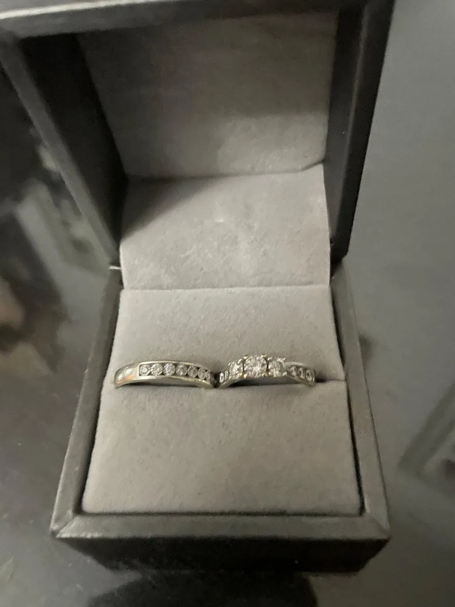 9ct wedding band and 18ct engagement ring
