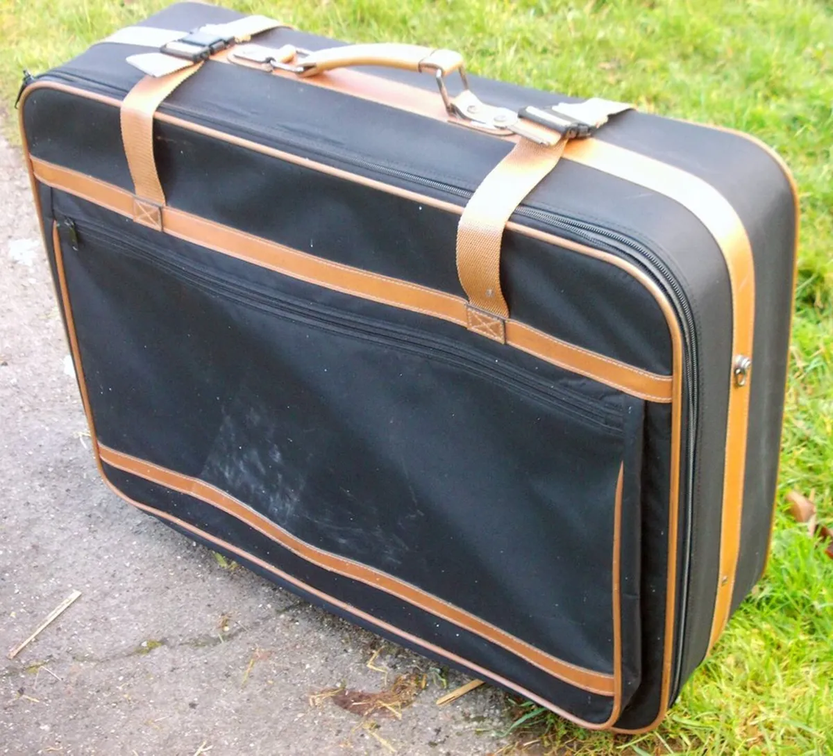 Large Navy Blue Suitcase with Brown Straps - Image 1