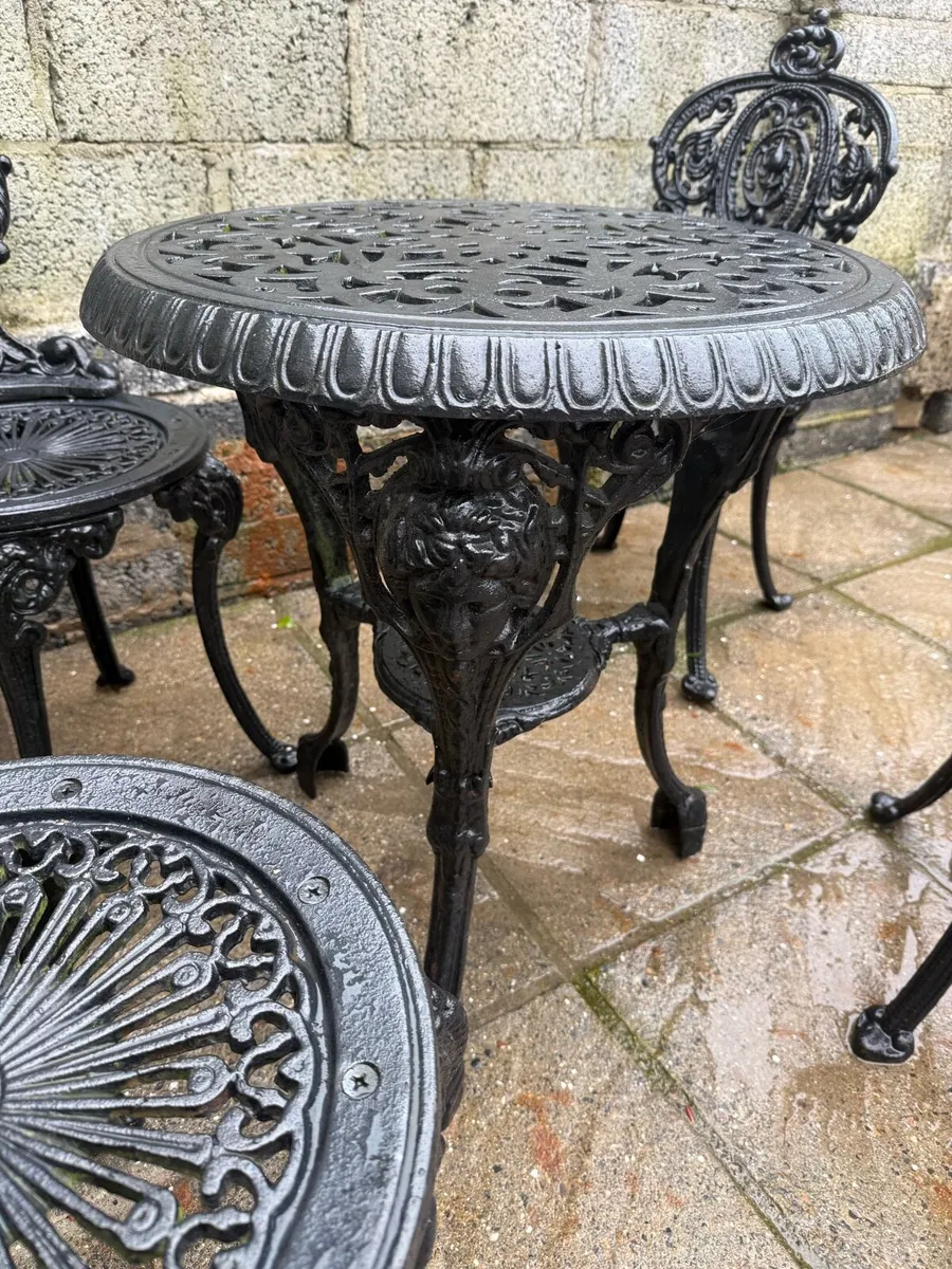 Cast iron table and chairs - Image 2