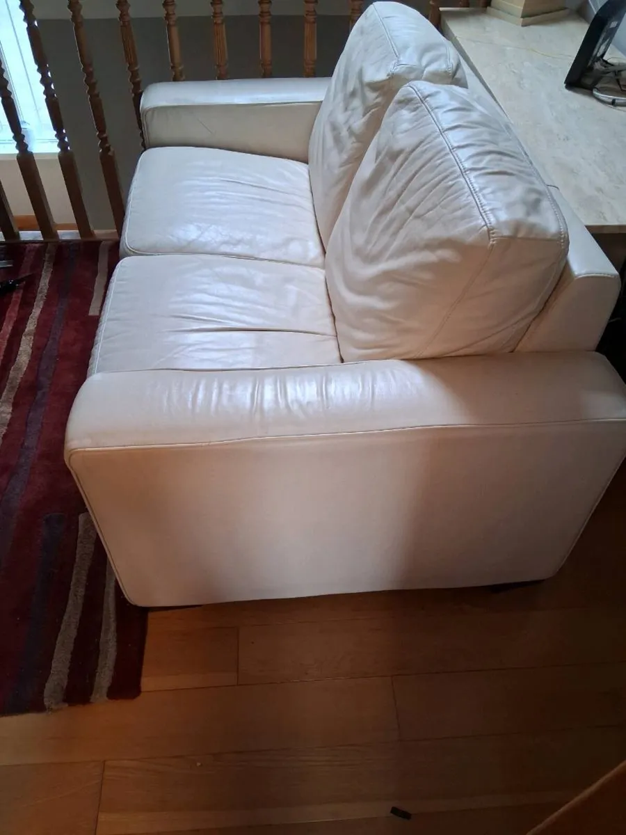 Two seater Natuzzi leather couch - Image 1