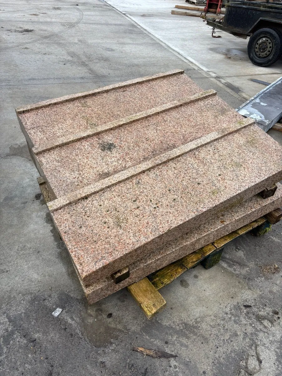 Yellow granite window cills.