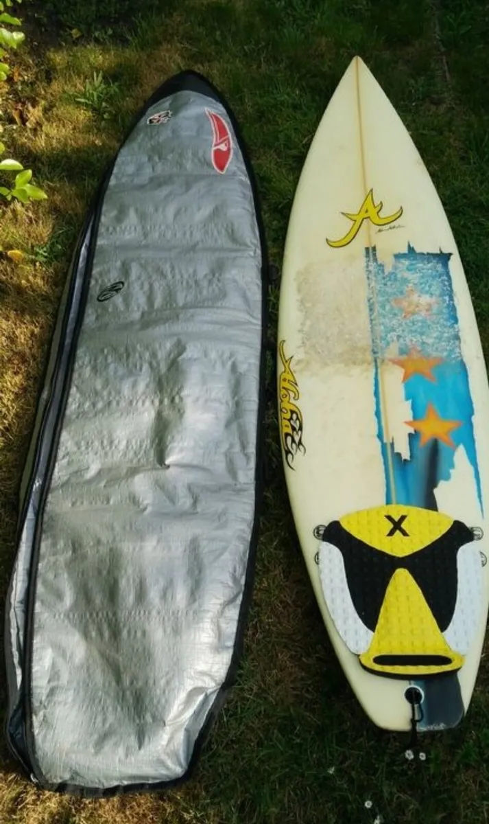 Surfboard & Padded surfboard bag - Image 1