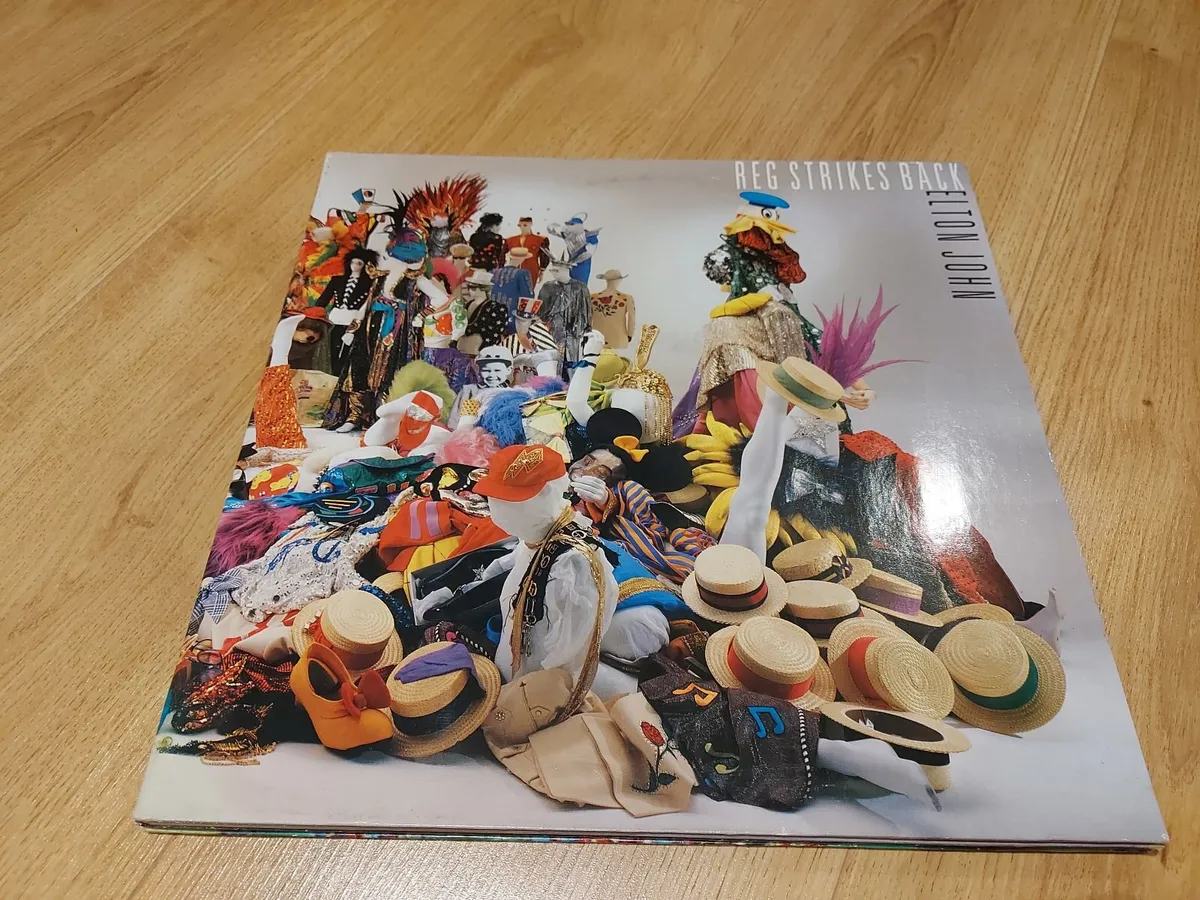 ELTON JOHN - REG STRIKES BACK - VINYL RECORD