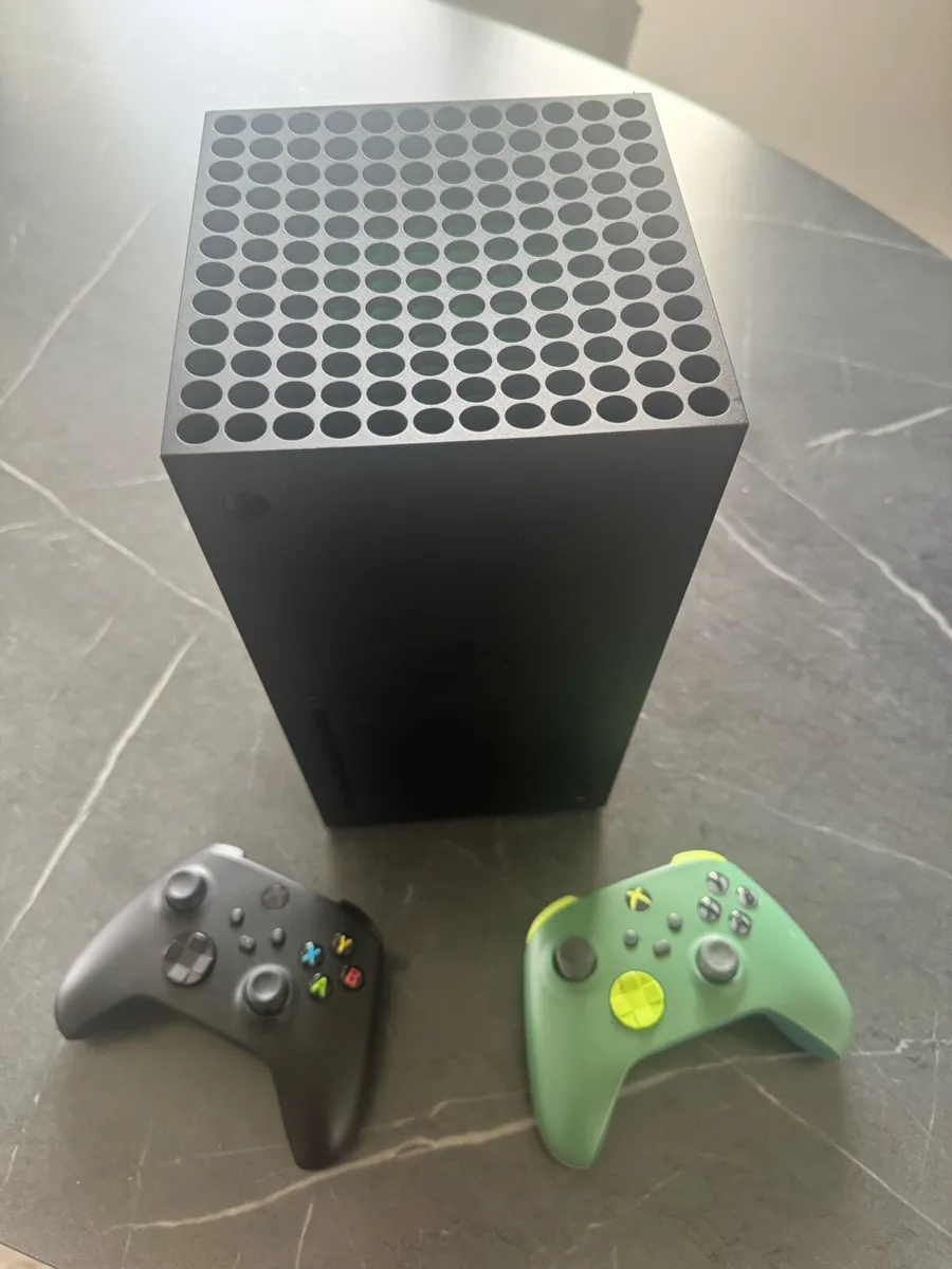 Xbox series X with two controllers