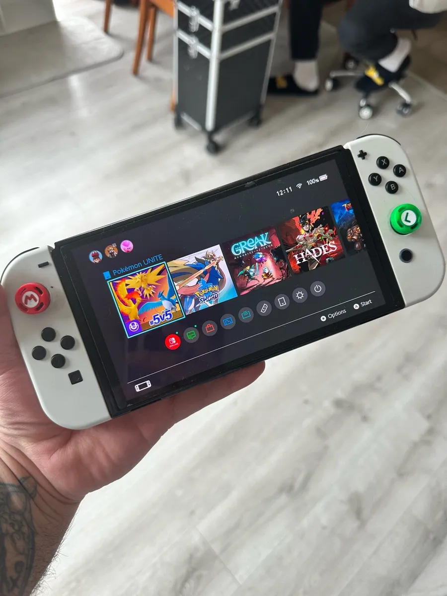 Nintendo Switch Oled + Joystick + Portable Charger - Image 2