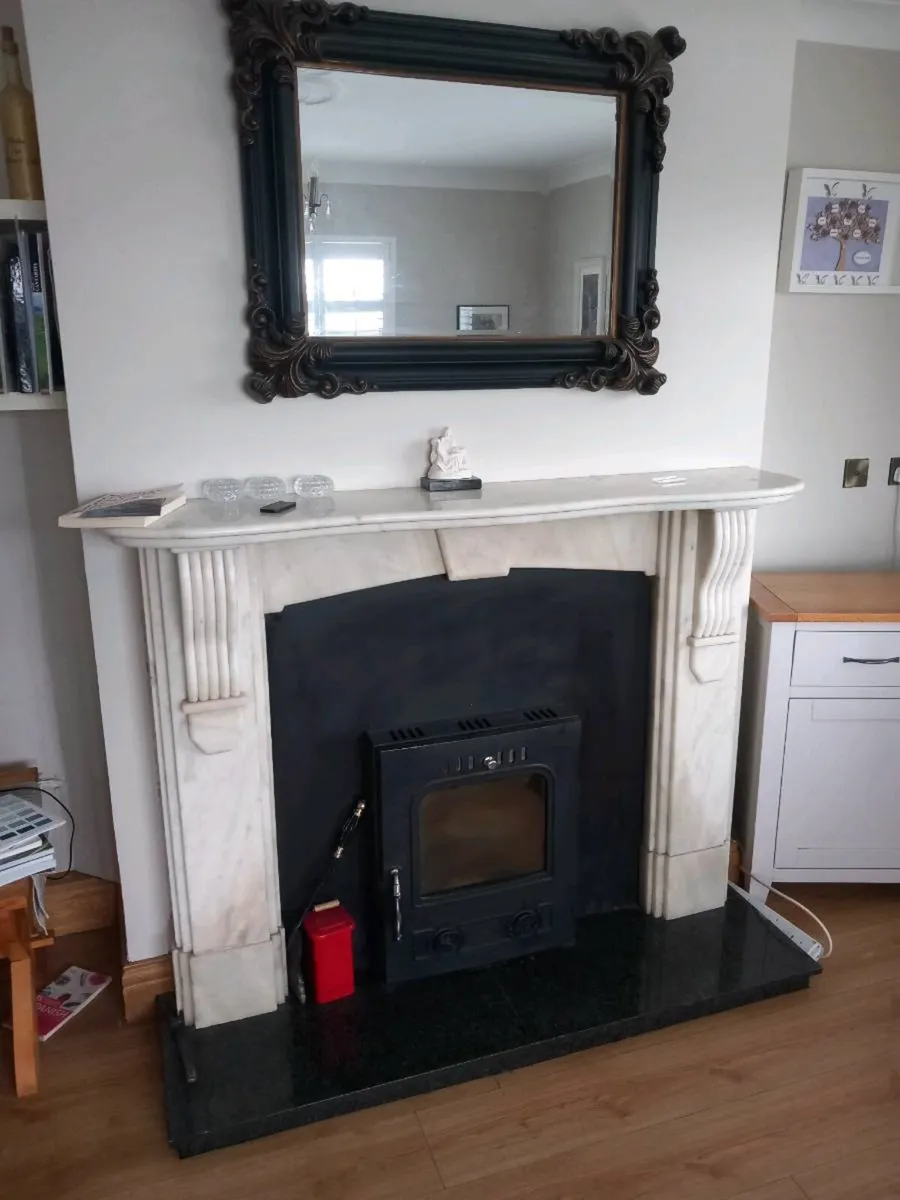Fireplace with  built in sstove - Image 1