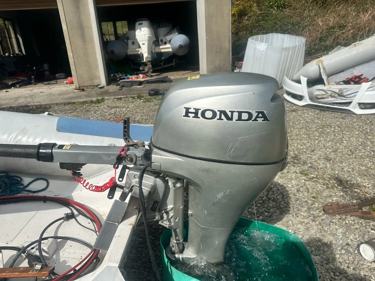 Honda 10hp long shaft outboard electric/man start - Image 1