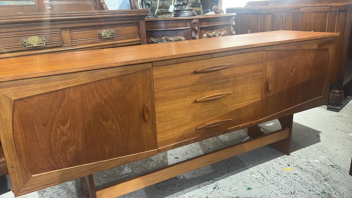 A mid-century walnut sideboard - Image 1
