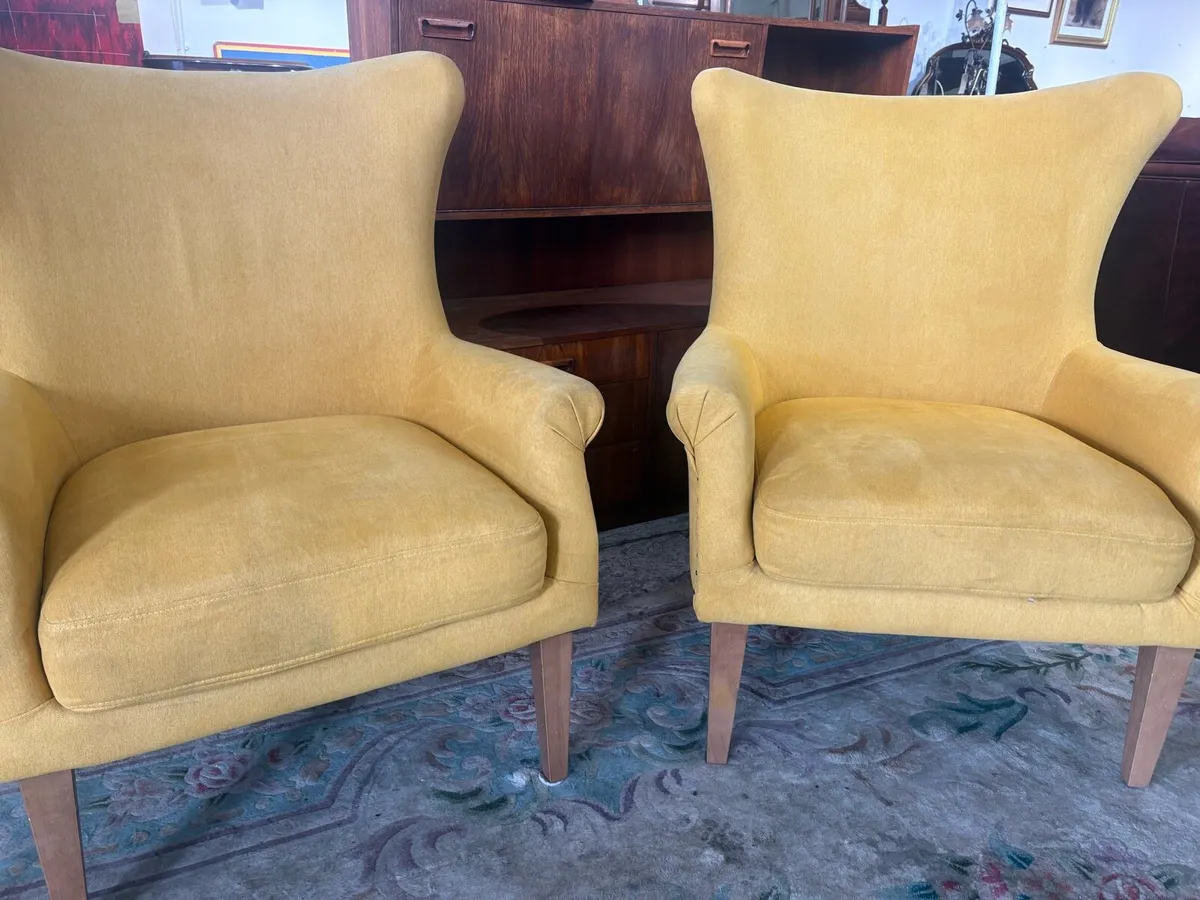 A modern mustard yellow upholstered wingbacks - Image 1