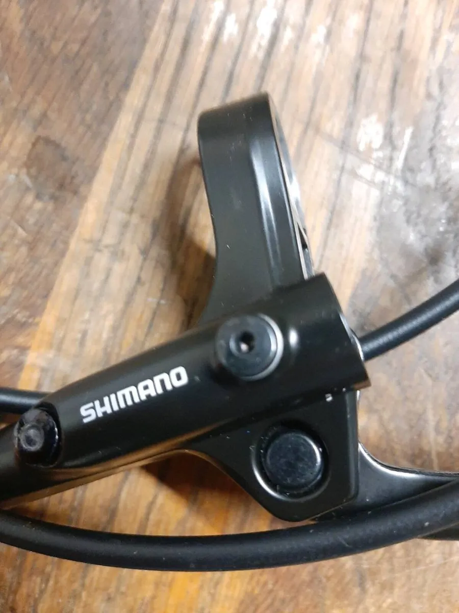 Shimano hydraulic rear break lever hosing caliper - Image 1