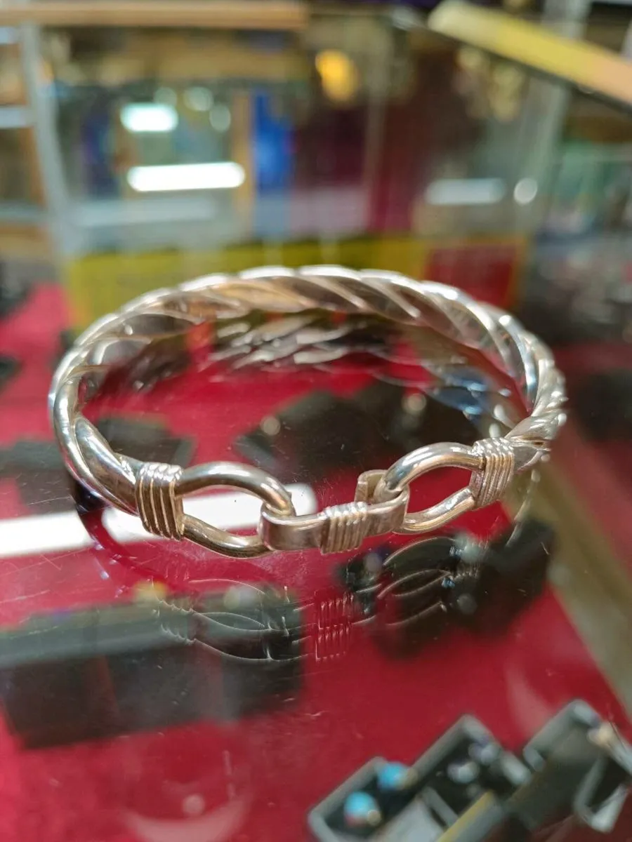 Large Silver Oval Twisted Bangle - Image 1