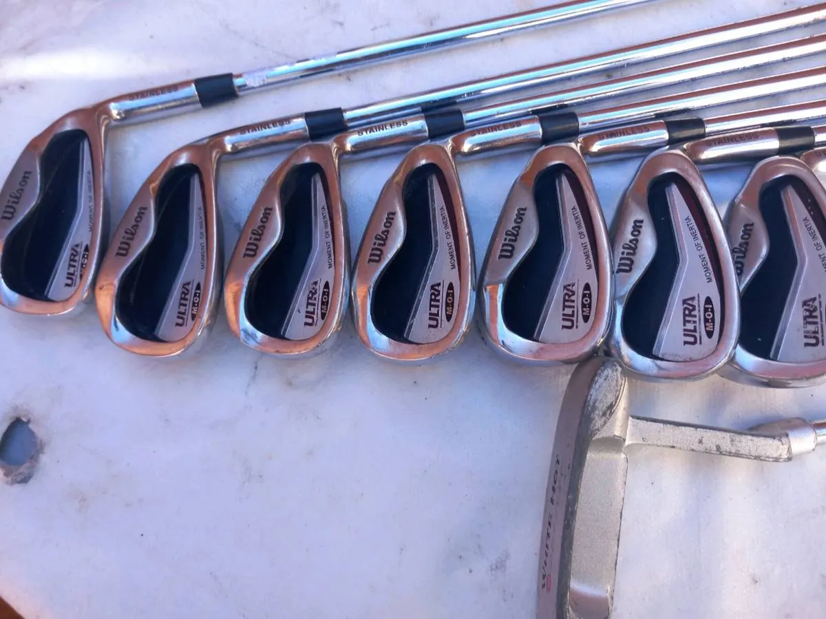 Wilson golf irons and Odyssey golf putter. - Image 2
