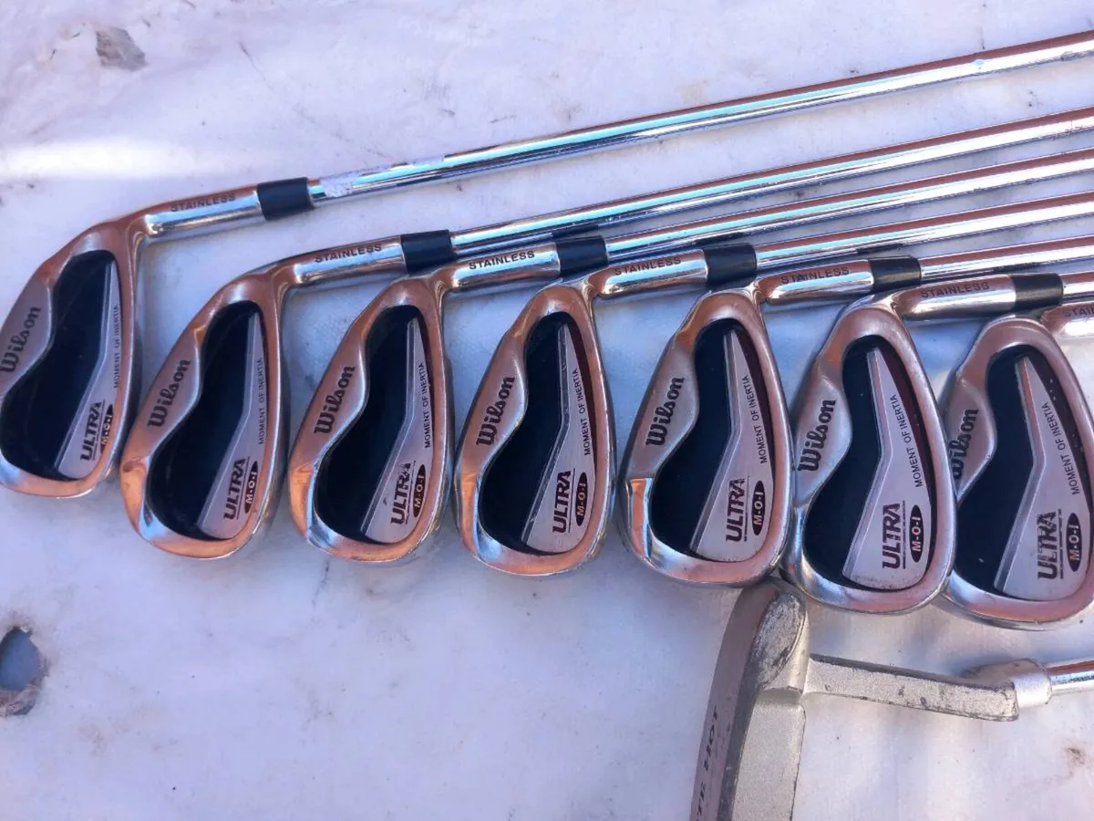 Wilson golf irons and Odyssey golf putter. - Image 4