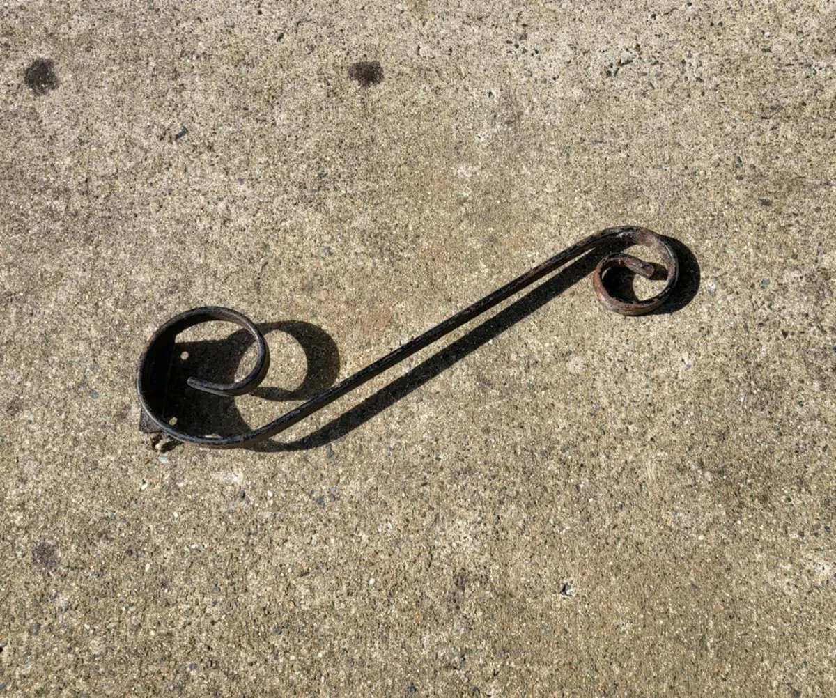 2x Wrought Iron brackets for hanging baskets.