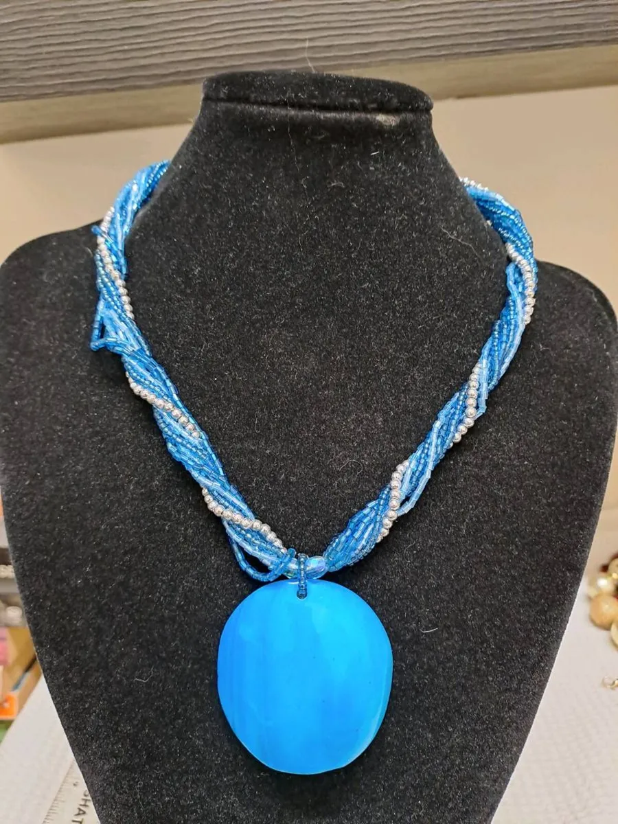 Blue Multi-Strand Beaded Necklace with Large Penda - Image 1