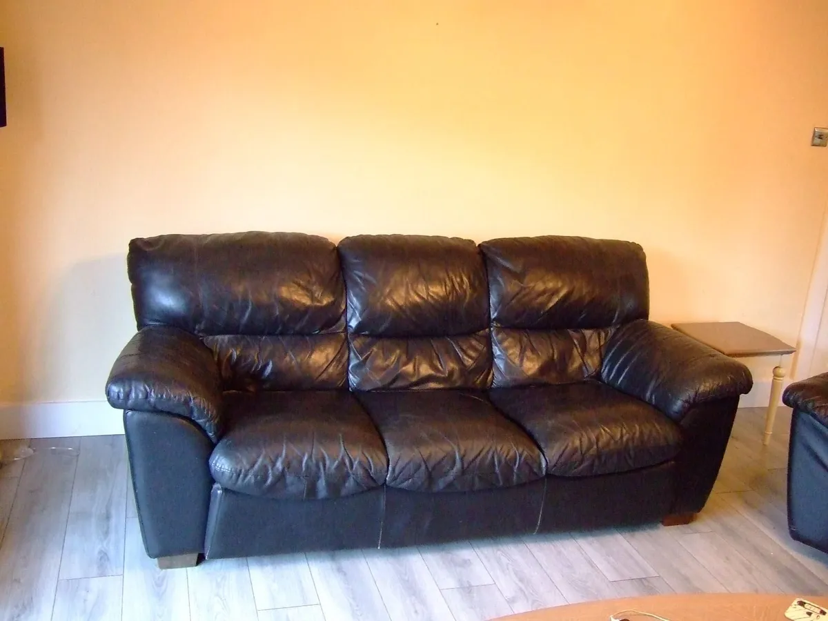 **FREE**  Leather Three Piece Suite - Image 1