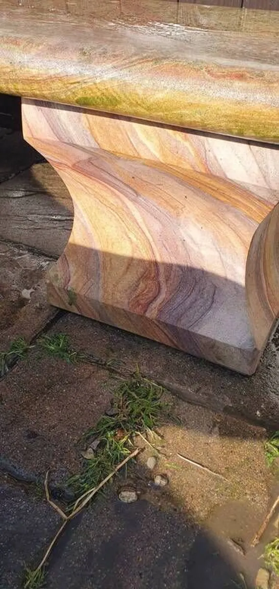 Sandstone garden table and two benches. - Image 1