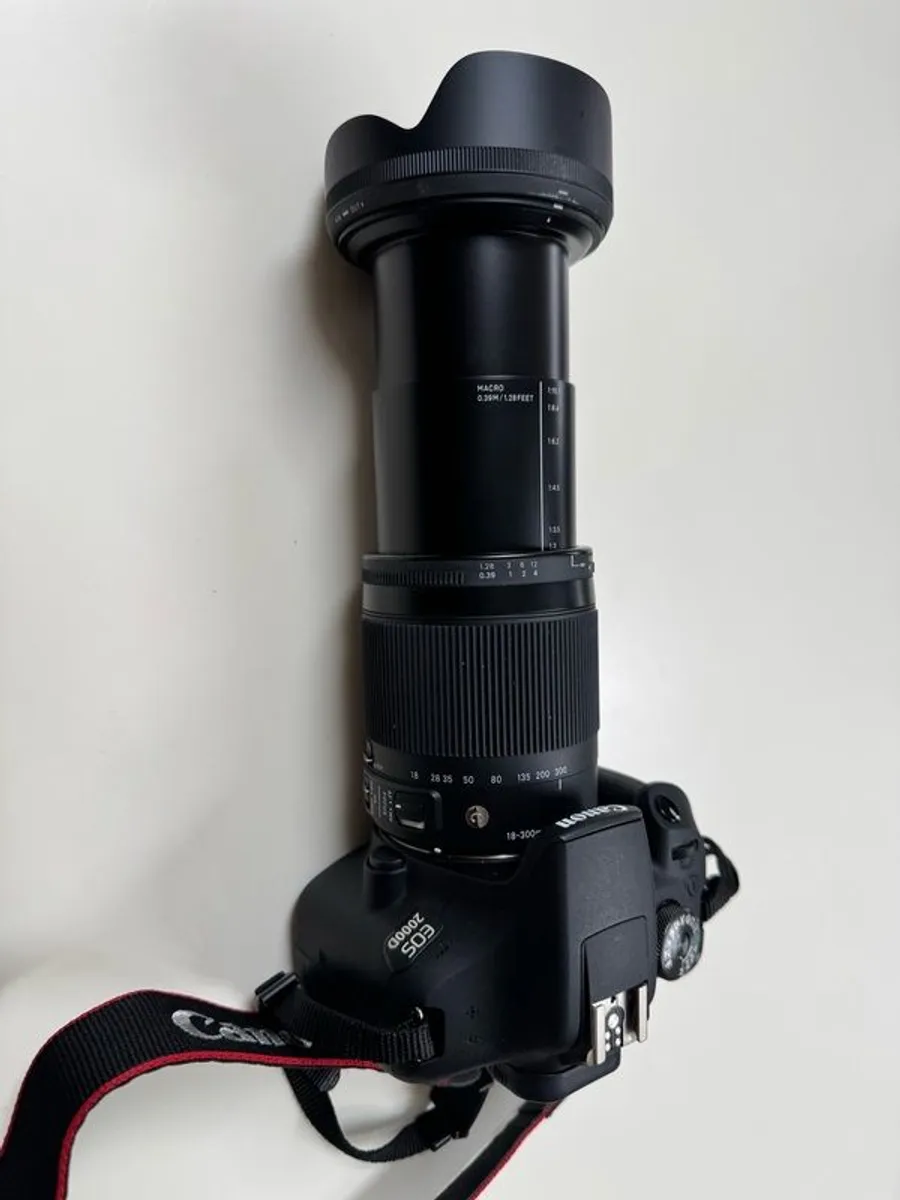 Canon EOS2000D DSLR camera with Sigma 18-300 Zoom lens - Image 1