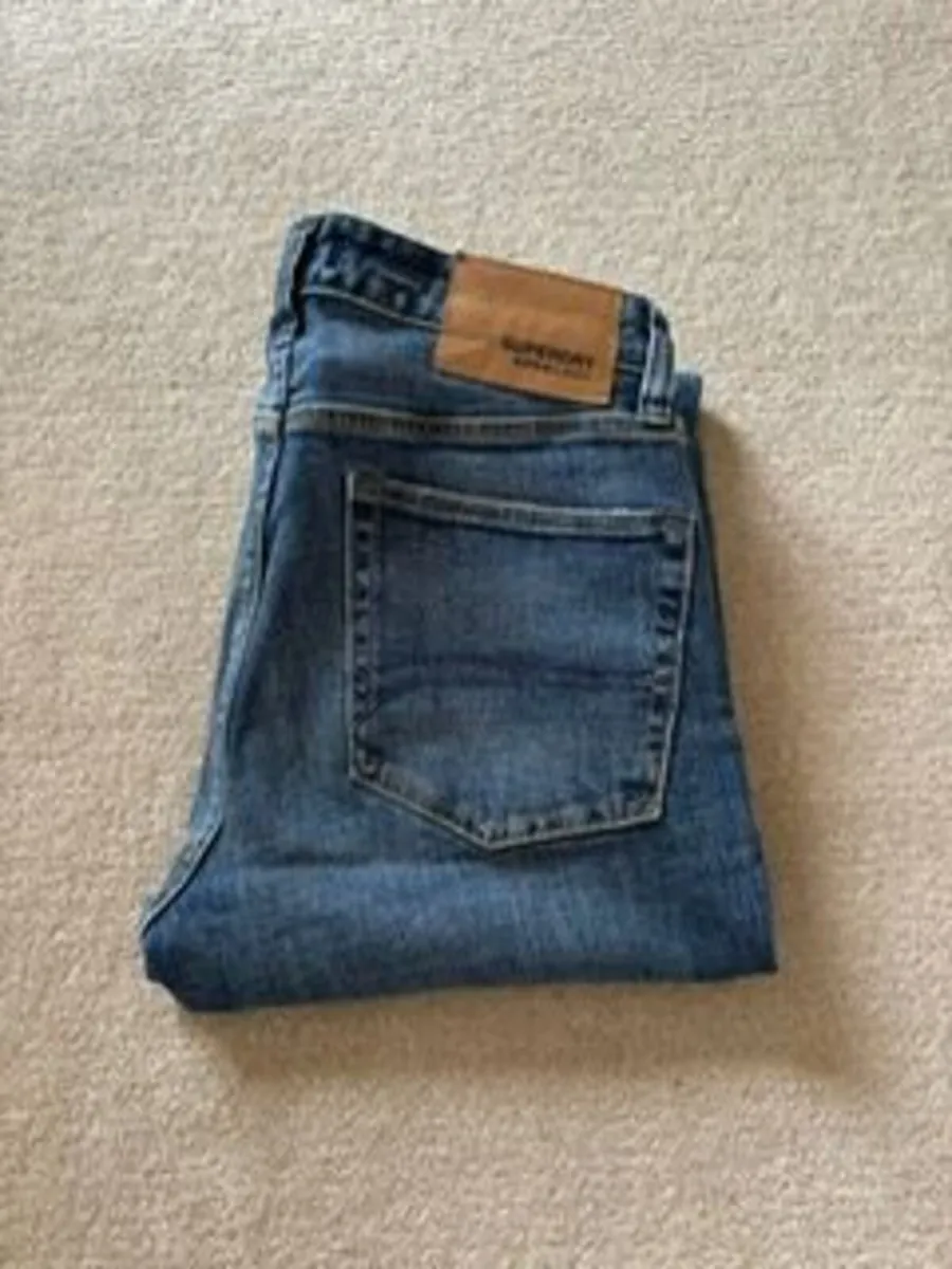 Superdry Ripped Denim Jeans - Image 1