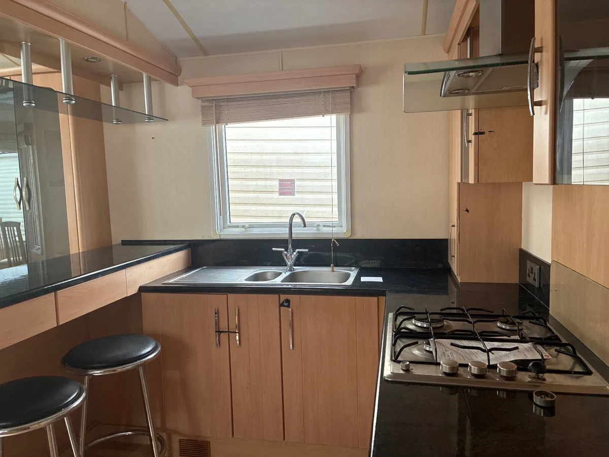 MC FADDENS. THE MOBILE HOME WAREHOUSE - Image 4