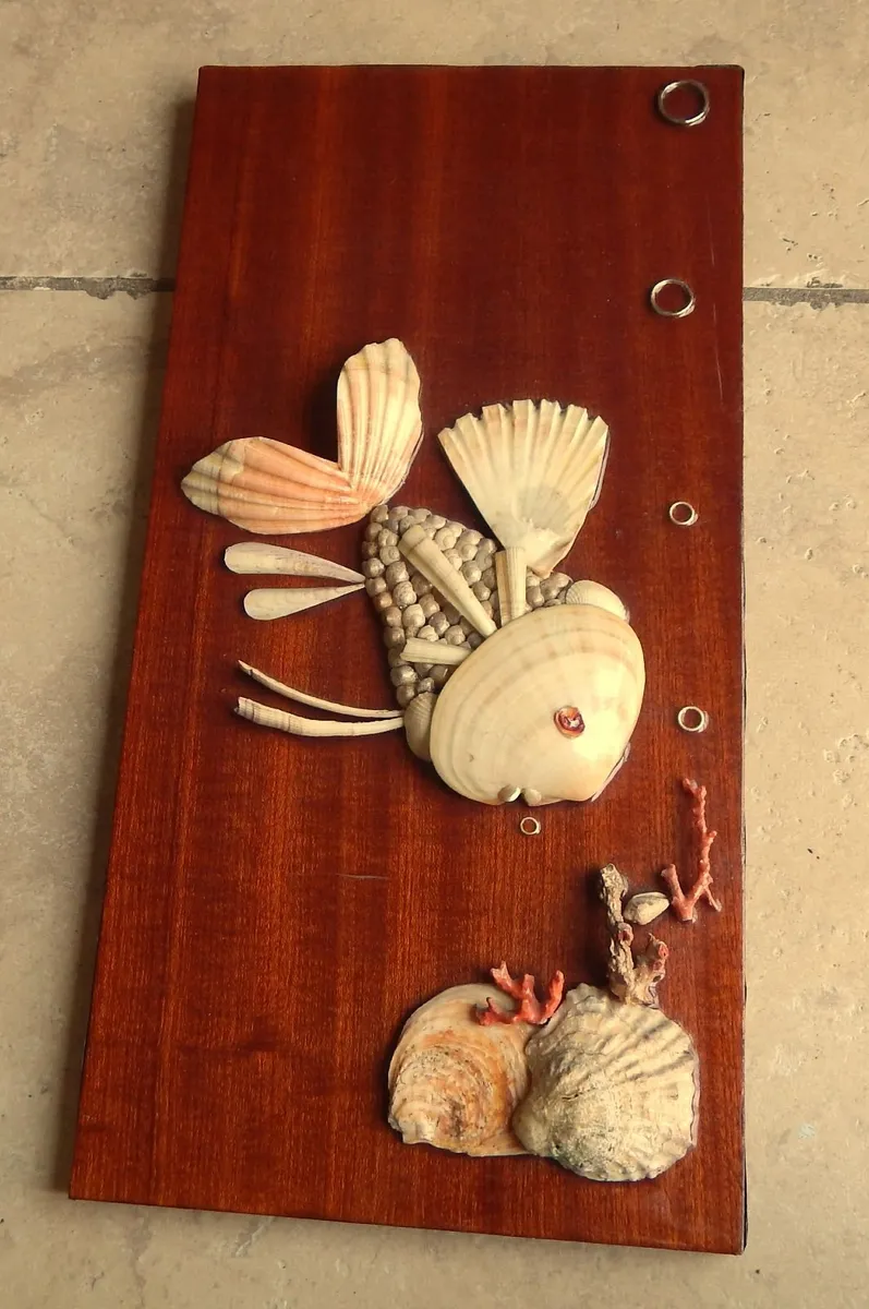 Sea Shell Art Piece on Wooden Background - Image 1
