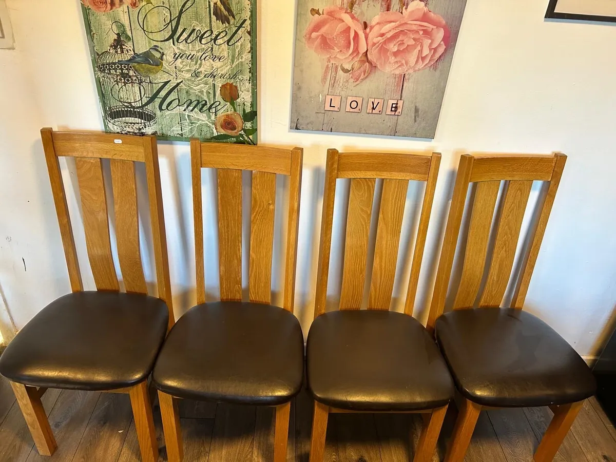 4 solid oak chairs