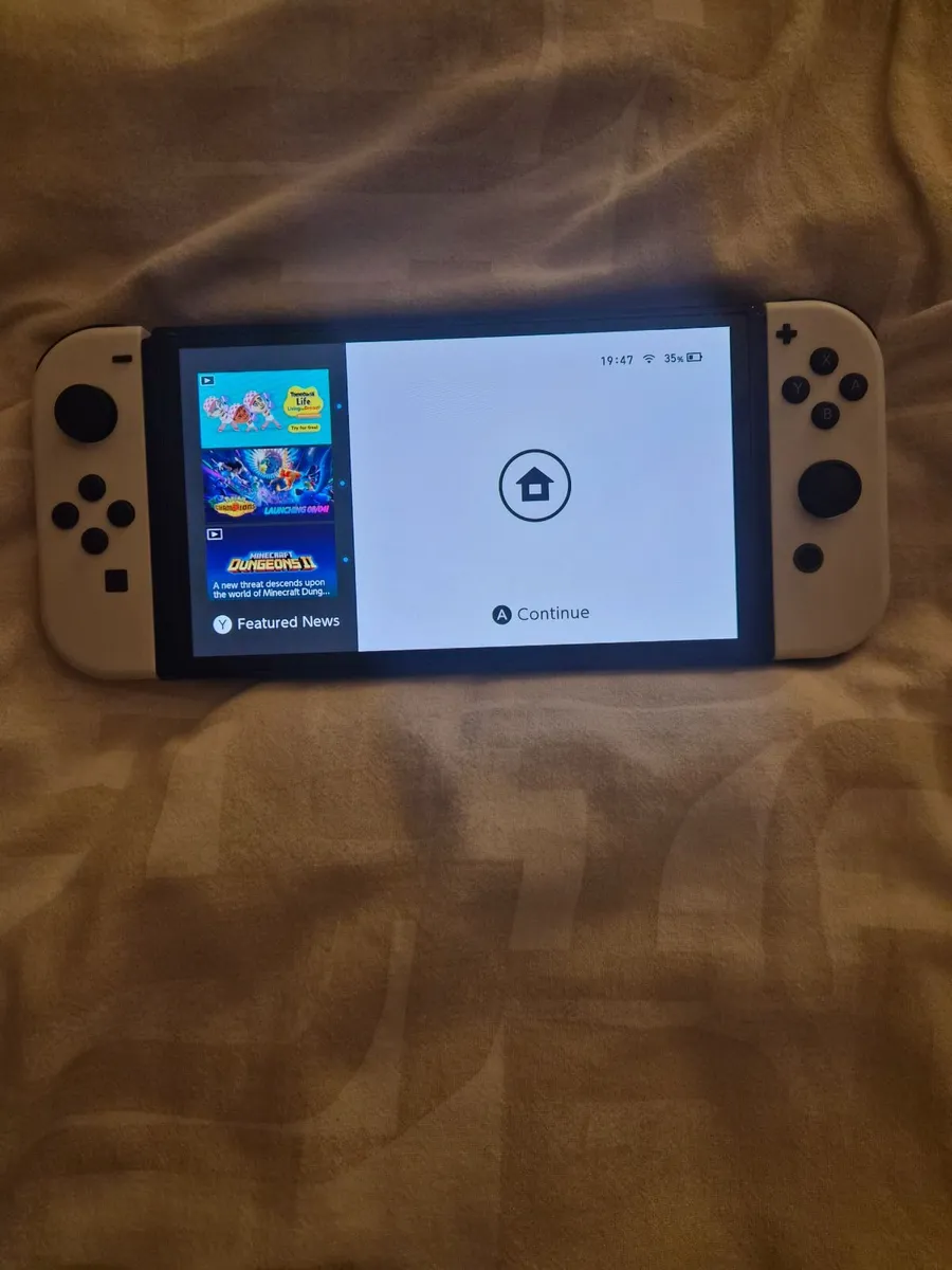 Nintendo Switch Oled With 2 Games - Image 1