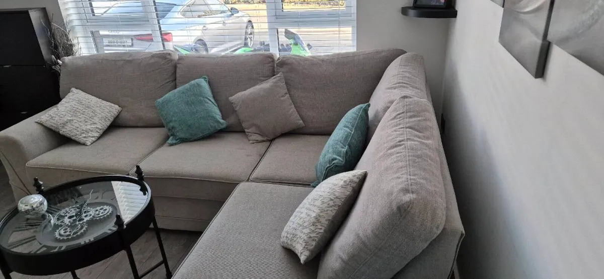 Grey corner sofa with foot poof. - Image 4