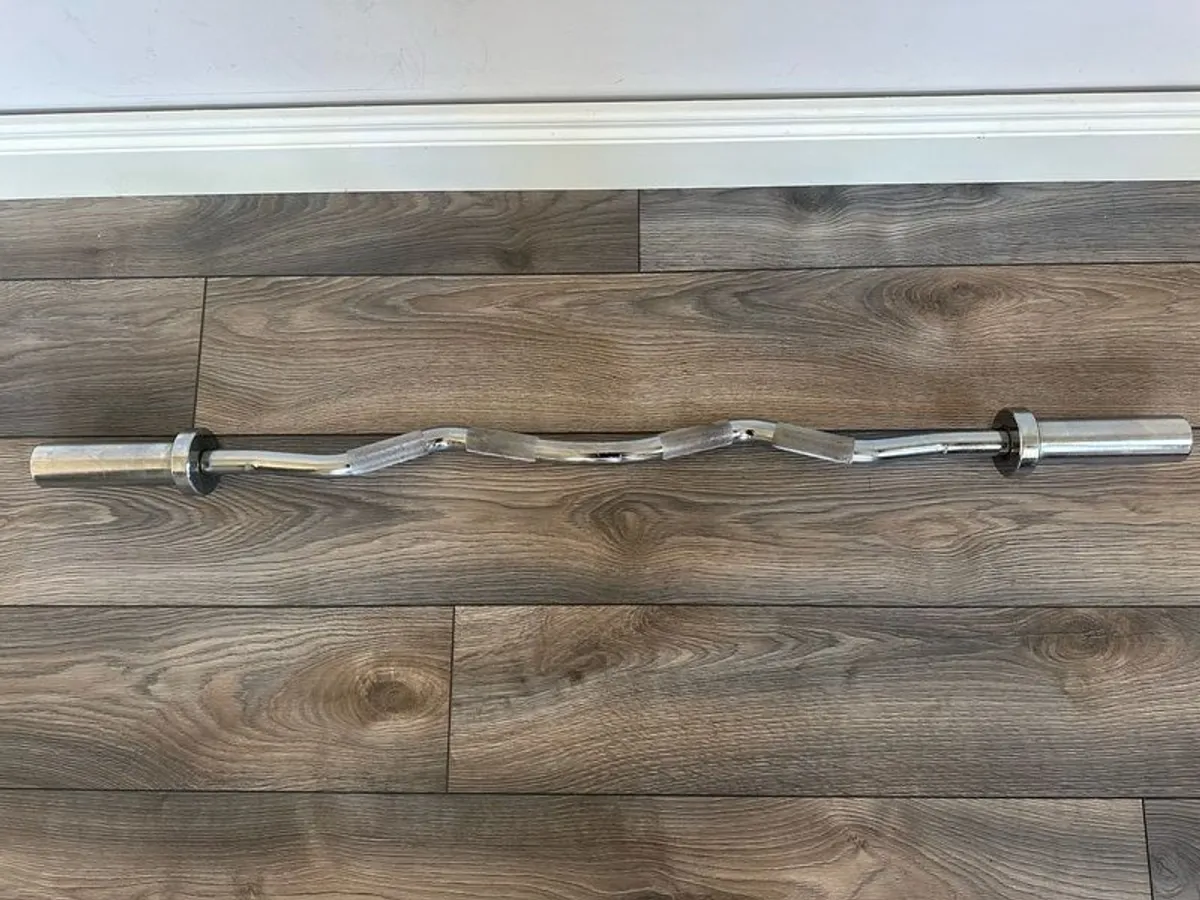 Home Gym Equipment: Adjustable Weider Gym Bench, Olympic bars, and Rubber Weights - Image 4