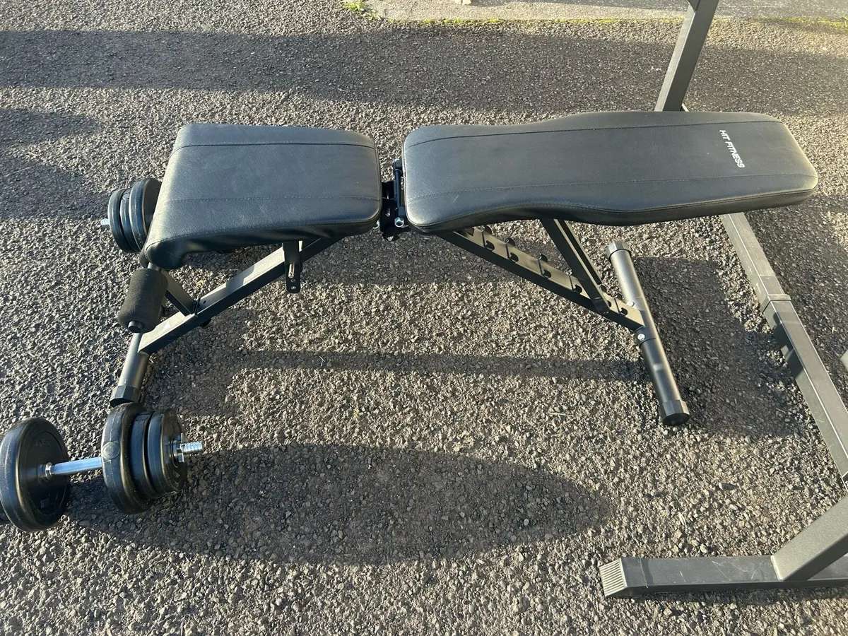 Full weights bench and barbell + extra plates - Image 4