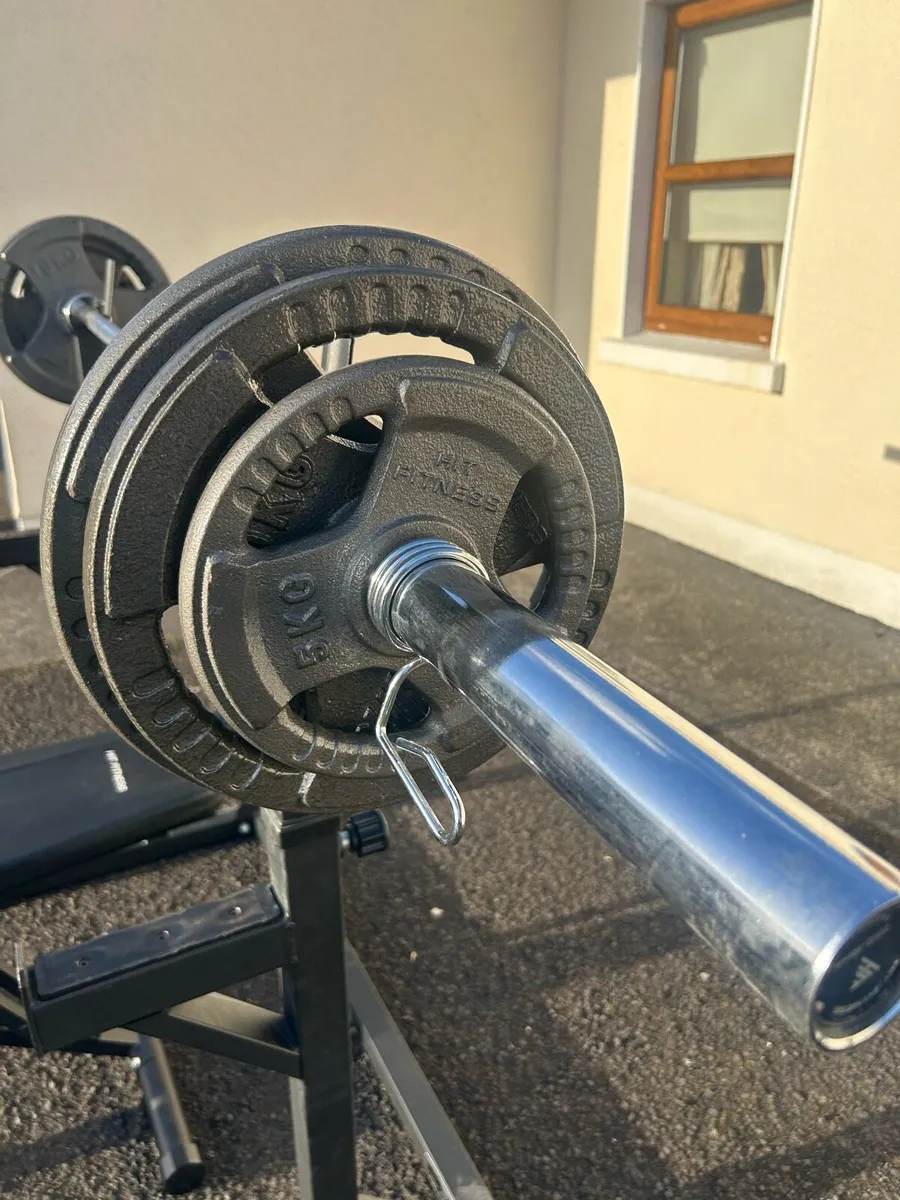 Full weights bench and barbell + extra plates - Image 2