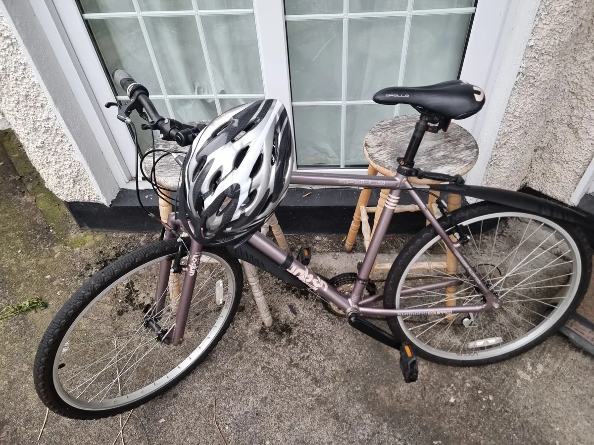 Bicycle and Helmet - Image 1