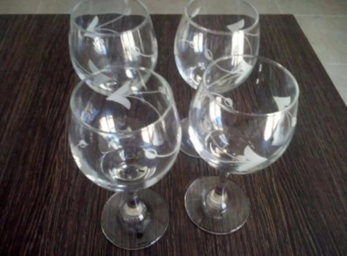 Wine Glasses with Etched Motif on Glass.