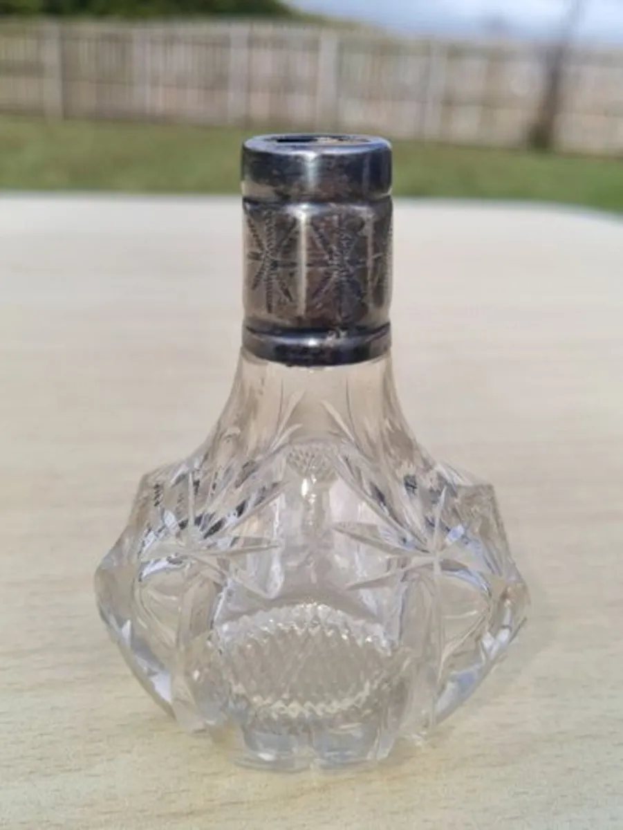 Vintage crystal bottle with silver top - Image 1