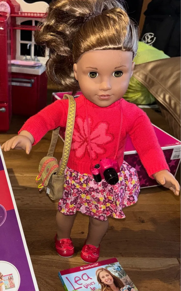 American Girl doll with matching book - Image 1