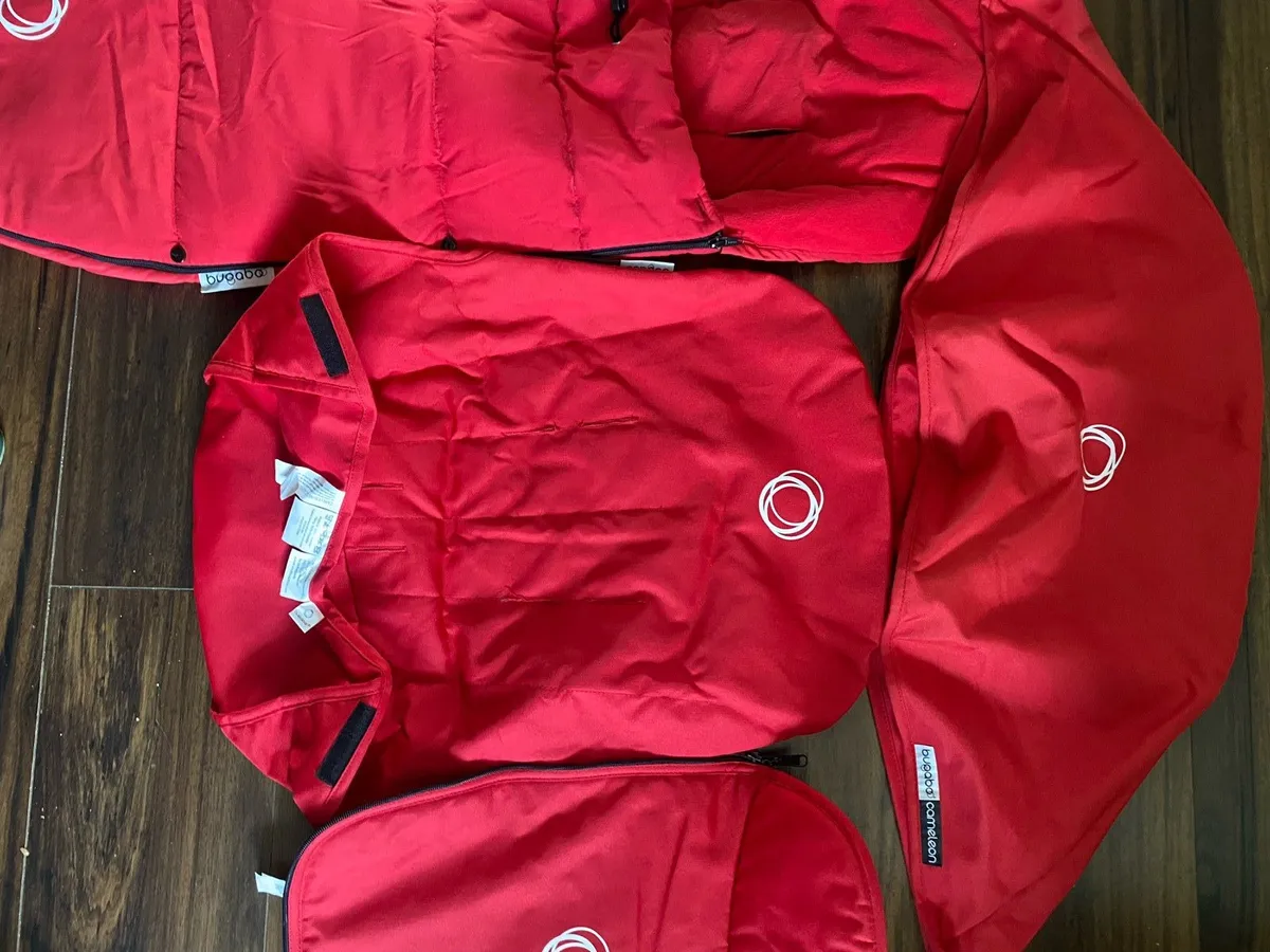 Bugaboo footmuff, seat liner, hood, bassinet bib - Image 1