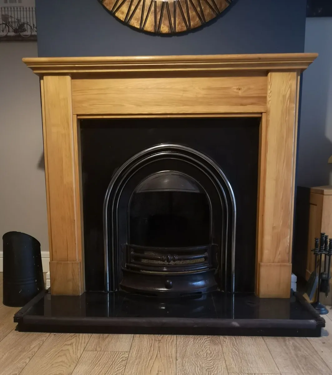 Fireplace and wooden surround - Image 1