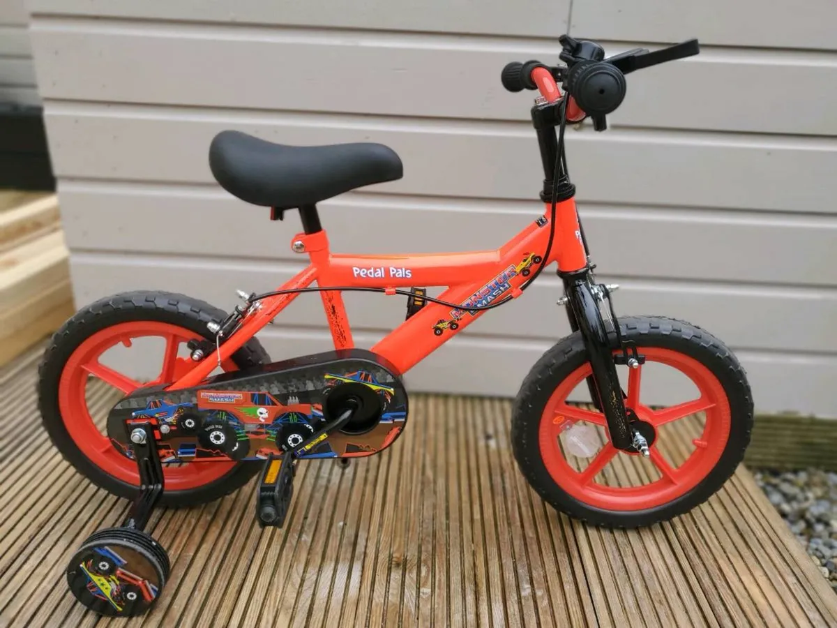 12"boys bike with stabilizers - Image 1