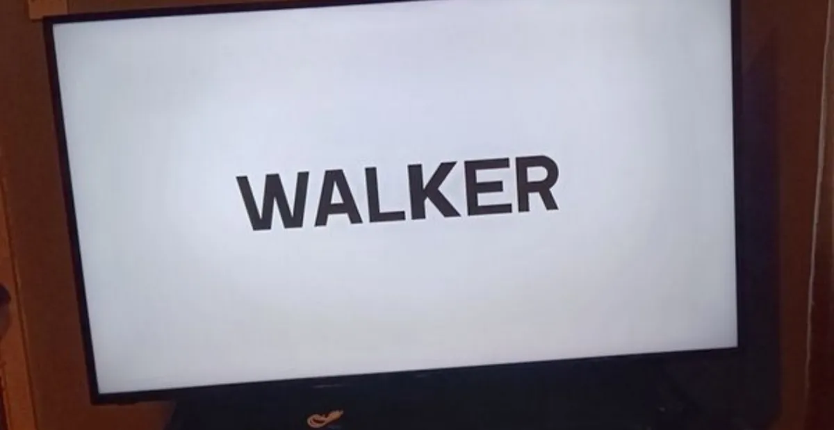 55 inch 4k TV with glass stand - Image 1