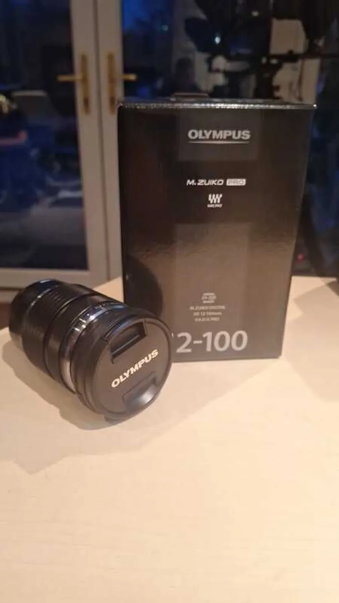 Olympus ED 12 100mm. Professional Zoom Lens - Image 1