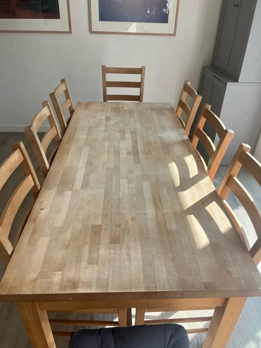 Solid oak dining table and 8 chairs with storage drawers - Image 2