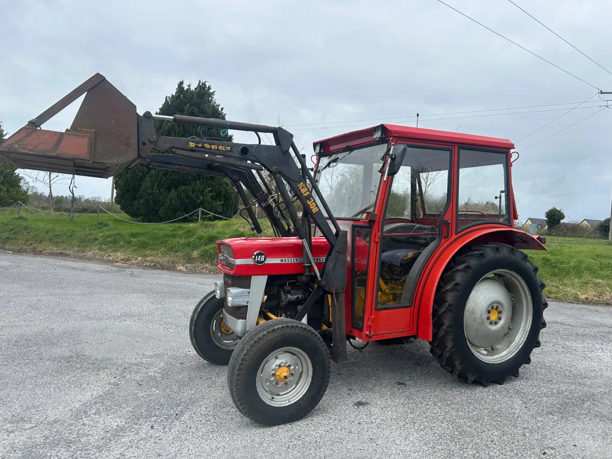 Massey Ferguson 148 with Loader and Bucket - Image 1