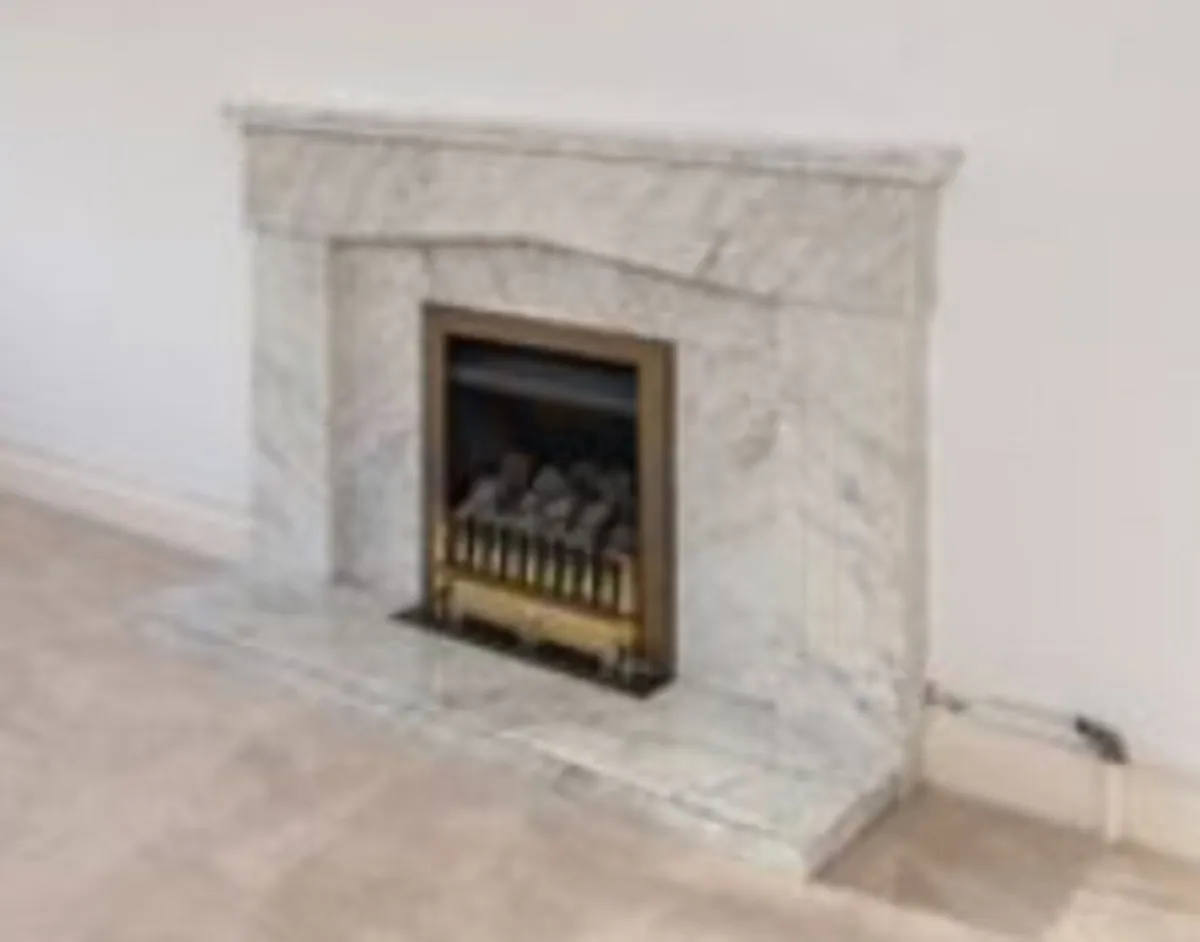 Gas fire and marble surround