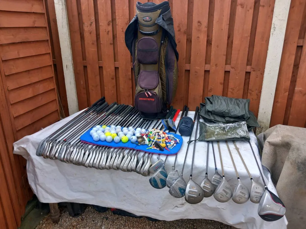 A selection of golf clubs and bags and golf balls - Image 1