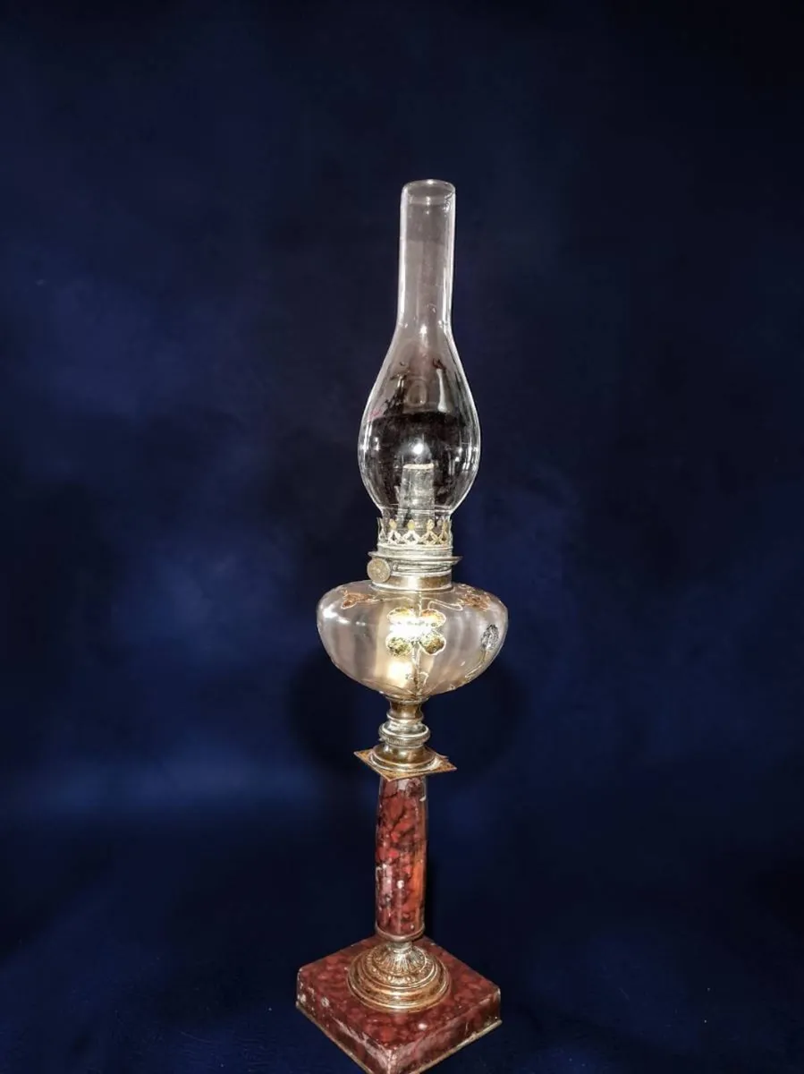 Tall marble and brass oil lamp