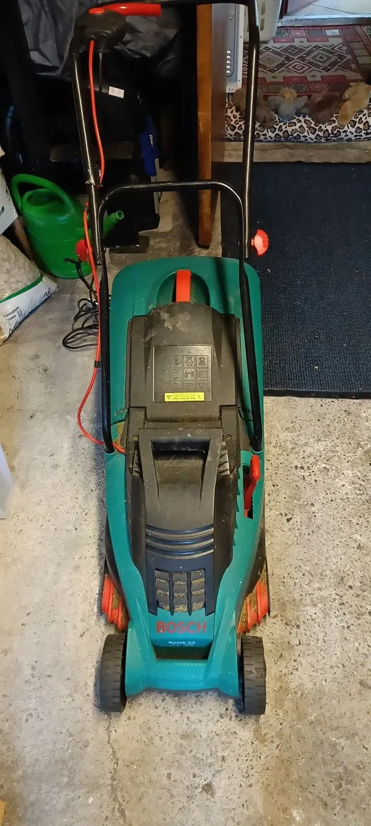 Electric Bosch lawnmower and grass trimmer - Image 1