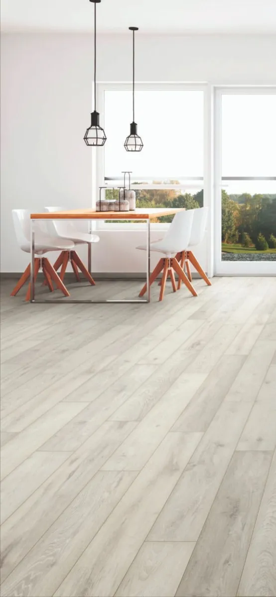 12MM LAMINATE FLOORING - Image 1